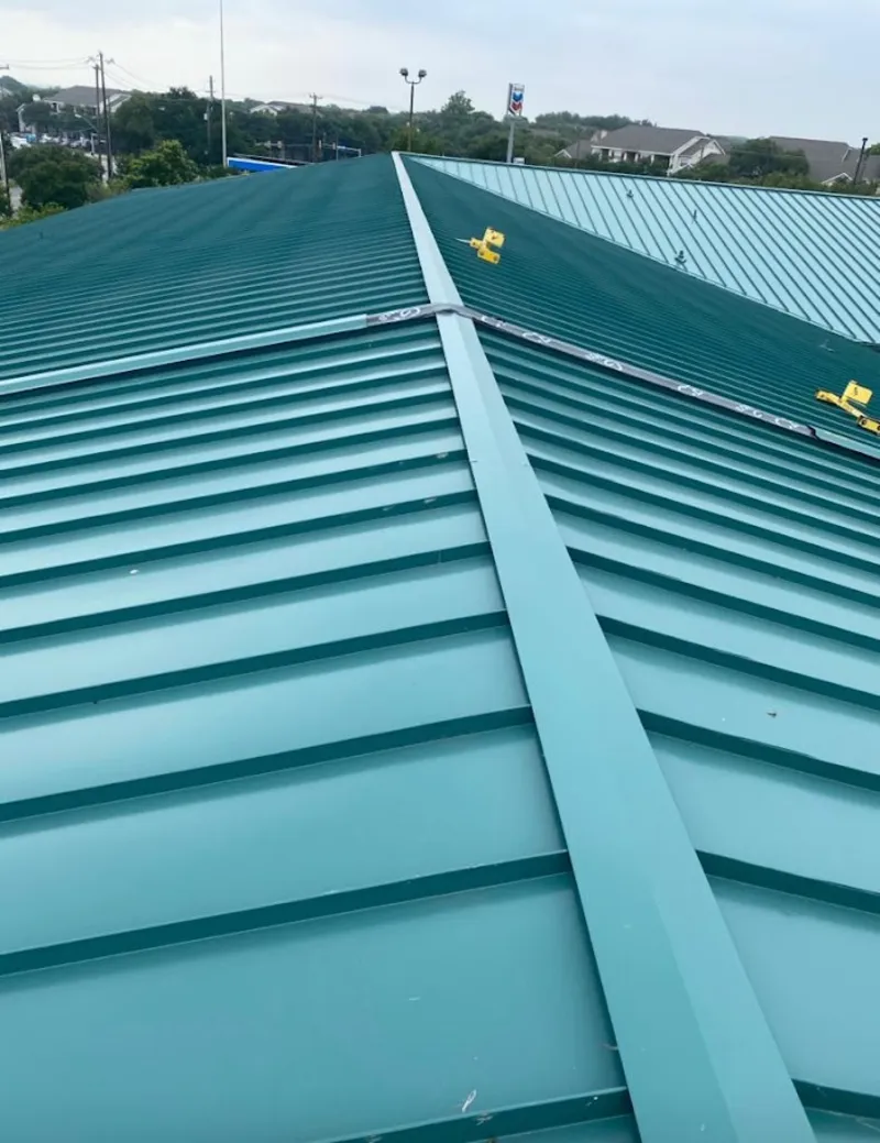 Green commercial metal roof ridge and valley for Metal Roof Repair in North Sewickley