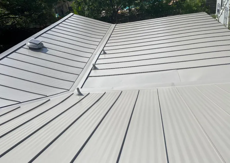 Solar attic fan installed on a metal roof for Roof Ventilation in North Sewickley